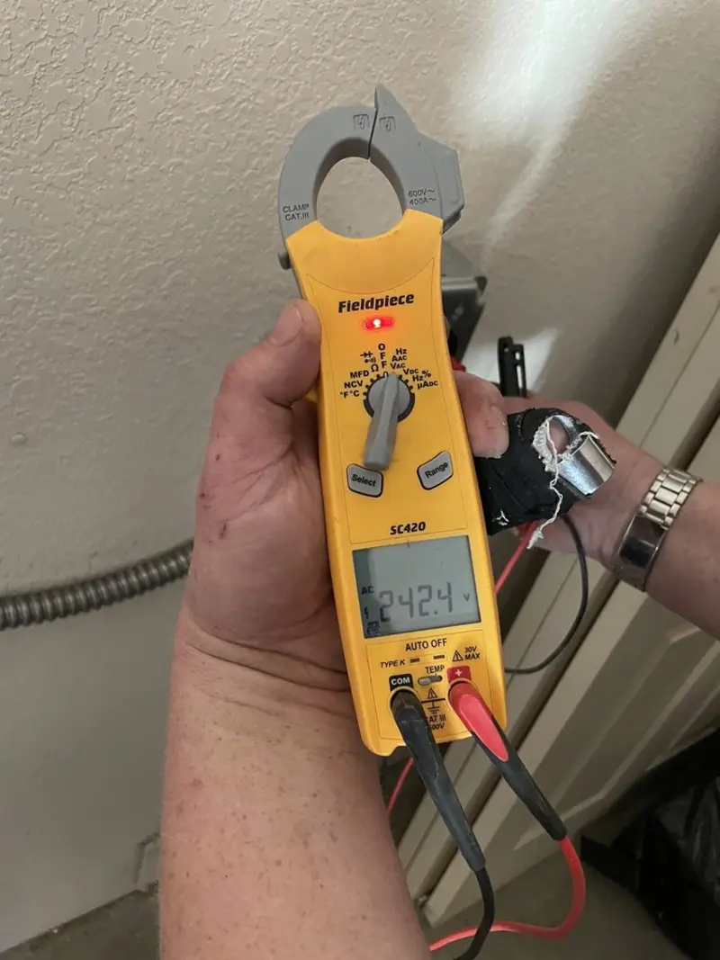 Voltage testing with clamp meter during Generator Installation in Lauderhill